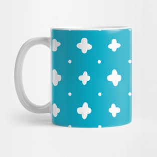 White crosses stitches over blue Mug